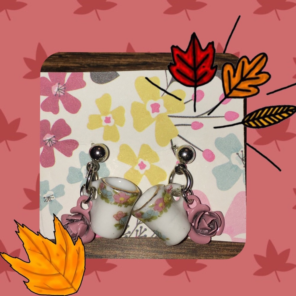 Adorable tea cup earrings with a pink dainty rose